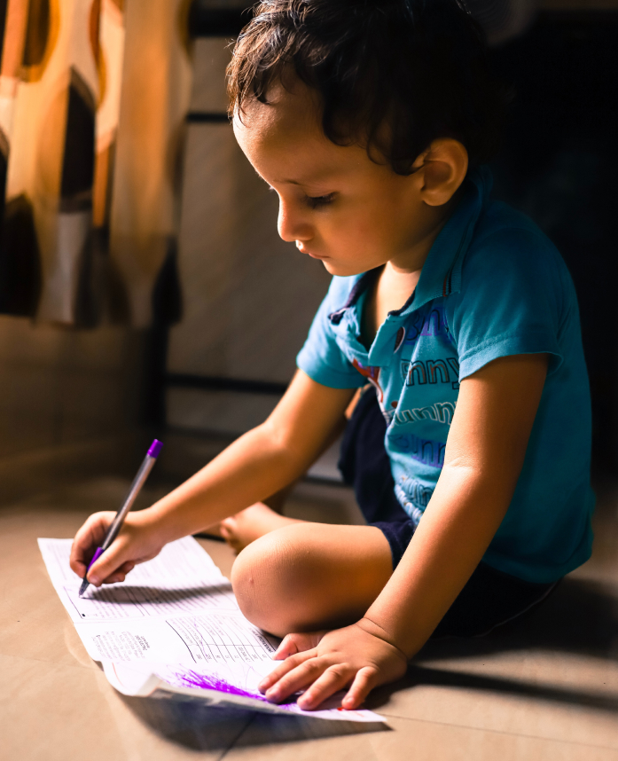 Photo of a child writing